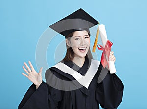 Asian female graduate student holding  diploma isolated