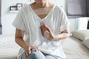 Asian female having or symptomatic reflux acids