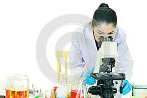 Medical technologist working with microscope photo