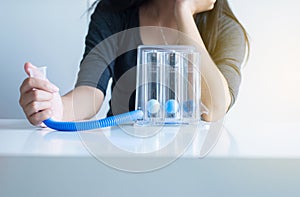 Asian female patients using incentivespirometer or three balls for stimulate lung
