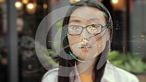 Asian female scanning of face features. Futuristic 3D identificating. Biometric facial recognition. Face id. Face