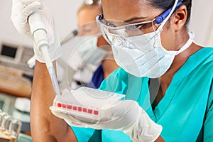 Asian Female Scientist Blood Test Medical Research Lab photo