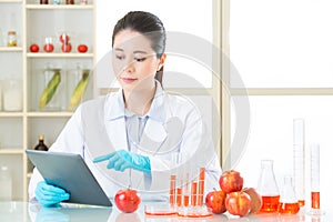 Asian female scientist research for genetic modification food