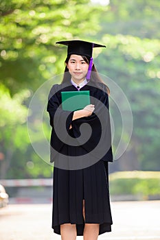 Asian female students graduated holding diplomas