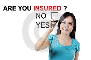 Asian female with text of are you insured