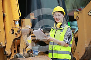 Asian female worker wear safety suits checking