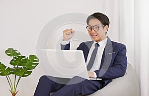 Asian Financial Advisor Wear Glasses Happy with Success