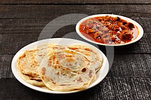 Asian flat bread paratha with meat curry