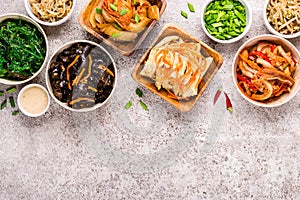 Asian food background. Korean spicy and vegetable pickled salads and appetizers