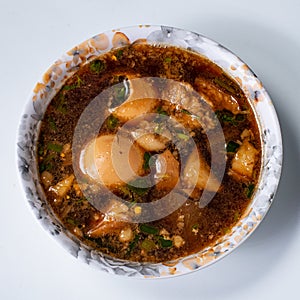 Asian food, boiled eggs in brown sauce or sweet