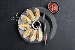 Asian food Gyoza or Jiaozi fried dumplings photo