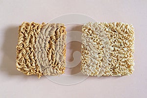 Asian food instant noodle isolate on pink wood table