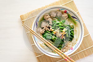 Asian food, Rice noodles soup with pork meatball and vegetables