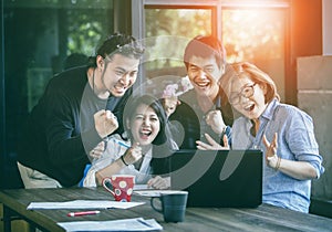 Asian freelance teamwork happiness emotion looking to laptop com