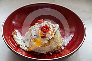 Asian fried egg with chilli and rice