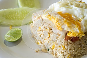 Asian fried rice with prawns vegetables and fried egg
