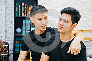 Asian gay couple spending time together at home. Portrait of happy gay men - Homosexual love concept.