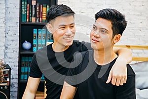 Asian gay couple spending time together at home. Portrait of happy gay men - Homosexual love concept.