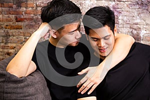 Asian gay couple spending time together at vintage home. Portrait of happy gay men - Homosexual love concept.