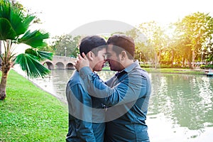 Asian gay couples romantic hug to make love happy on vacation travel