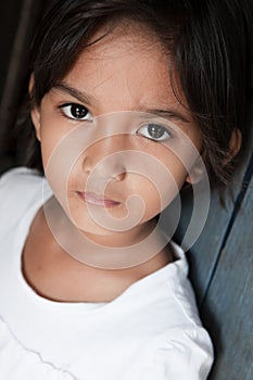 Asian girl against wall in Philippines