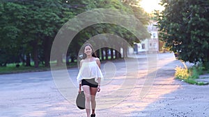 Asian girl beautiful female portrait walking away to sun