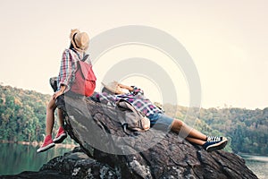 Asian girl and boy backpack in nature