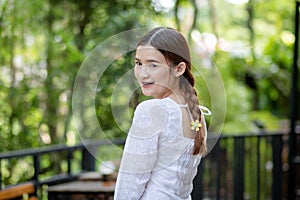 Asian girl Bright smiles and happy eyes. with a gentle and natural makeup Smiling beautiful woman Wearing a cute white dress. copy