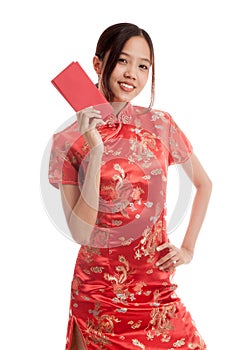 Asian girl in chinese cheongsam dress with red envelope