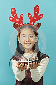 Asian girl with a Christmas concept headdress Child