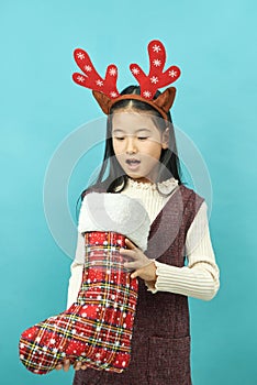Asian girl with a Christmas concept headdress Child