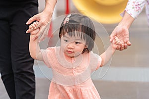 Asian girl daughter holding family hand, Family concept