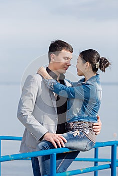 Asian girl and european guy on seashore