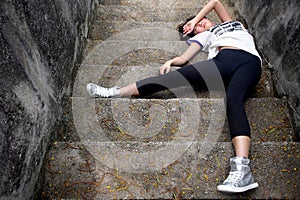 Asian girl fallen down steps