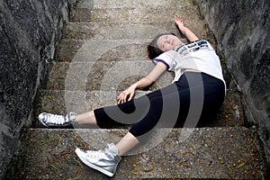 Asian girl fallen down steps