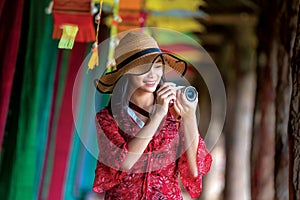 Asian girl fun and play in Lamduan woven cloth coffee shop