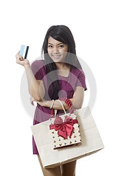 Asian Girl going shopping with credit card