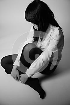 Asian girl with jacket sitting