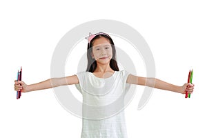 Asian girl kid holding color pencils isolated on white background. Image with Clipping path