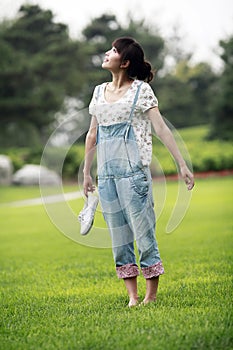 Asian girl on the lawn