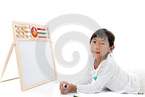 Asian girl laying with blank whiteboard on white