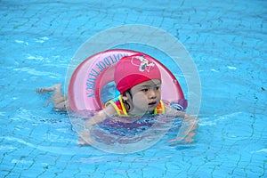 Asian girl learn to swim