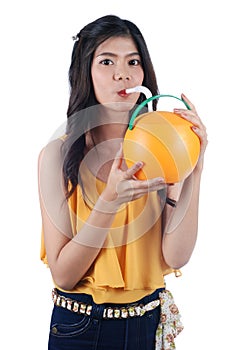 The Asian girl quench thirst. photo