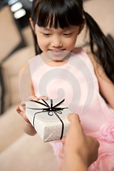 Asian Girl Receiving Gift