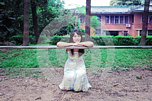 A Asian girl stroll in the park