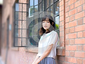 Asian girl student in school uniform outdoor
