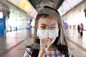 Asian girl suffer from cough with face mask protection,Sick girl