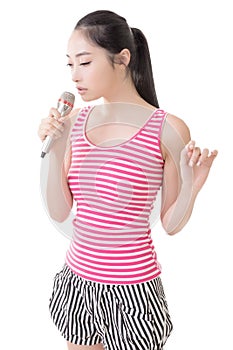 Asian girl take a microphone singing or speak