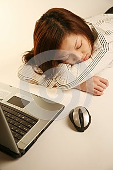 Asian girl taking a nap photo