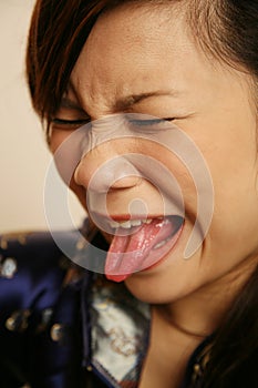 Asian girl with tongue out